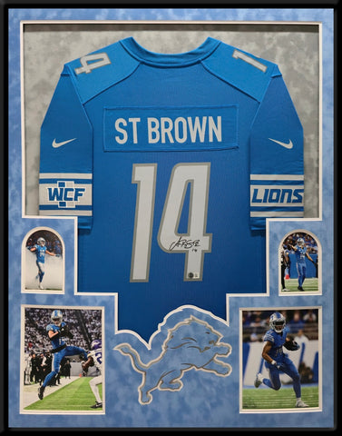 SUEDE FRAMED DETROIT LIONS AMON-RA ST. BROWN AUTOGRAPHED JERSEY BECKETT HOLO