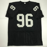 Autographed/Signed CLELIN FERRELL Oakland Black Football Jersey JSA COA Auto