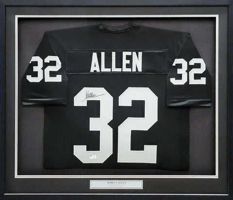 RAIDERS MARCUS ALLEN AUTOGRAPHED FRAMED BLACK JERSEY BECKETT WITNESS 210139