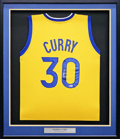 WARRIORS STEPHEN CURRY AUTOGRAPHED SIGNED FRAMED YELLOW JERSEY BECKETT 215856