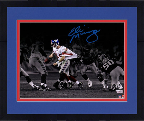 FRMD Eli Manning Giants Signed 11x14 Super Bowl XLII Escaping Spotlight Photo