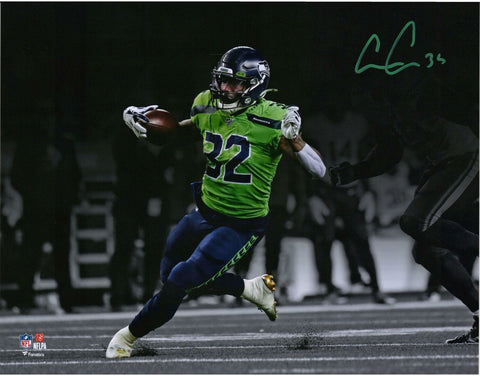 Chris Carson Seattle Seahawks Signed 11" x 14" Green Jersey Spotlight Photo
