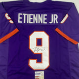 Autographed/Signed TRAVIS ETIENNE Clemson Purple College Football Jersey JSA COA