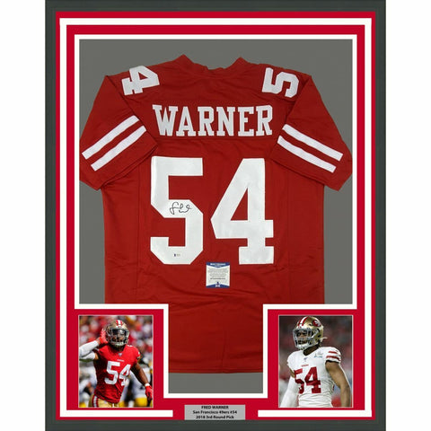 FRAMED Autographed/Signed FRED WARNER 33x42 Red Football Jersey Beckett BAS COA
