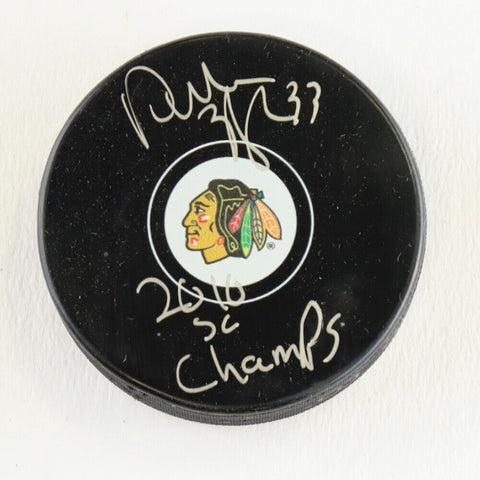 Dustin Byfuglien Signed Chicago Blackhawks Logo Puck "2010 SC Champs" (Schwartz)