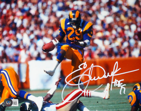 Eric Dickerson Autographed Los Angeles Rams 8x10 Leap W/HOF-Beckett W Hologram