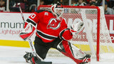 Martin Brodeur Signed Team Canada Logo Hockey Puck (JSA) New Jersey Devil Goalie