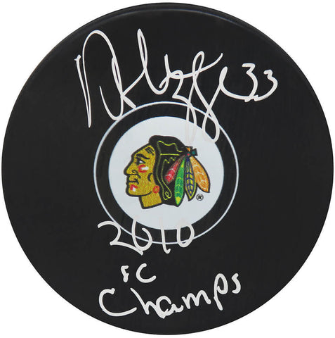 Dustin Byfuglien Signed Blackhawks Logo Hockey Puck w/2010 SC Champs - (SS COA)