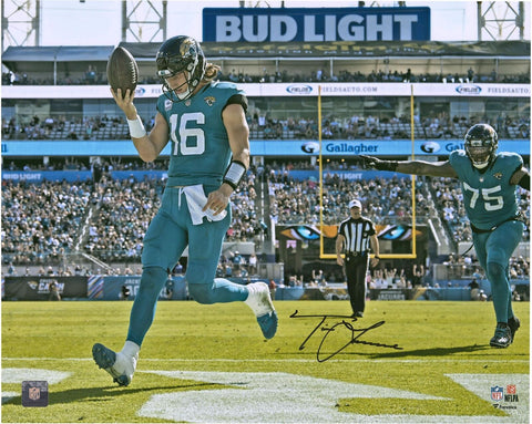 Trevor Lawrence Jaguars Signed 16x20 Teal Rush Touchdown Photograph