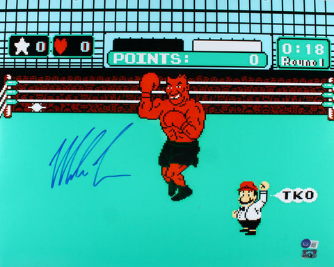 Mike Tyson Autographed 16x20 Punch Out Photo- Beckett Hologram *Blue