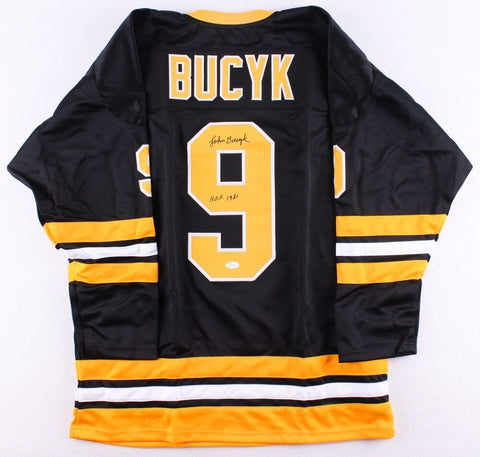 Johnny Bucyk Signed Bruins Captain Jersey Inscribed "H.O.F. 1981" (JSA COA)