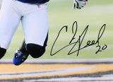 Ed Reed Autographed Baltimore Ravens 16x20 HM Running Photo-Beckett W Hologram