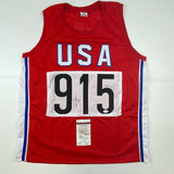 Autographed/Signed Carl Lewis Track United States USA Olympics Jersey JSA COA
