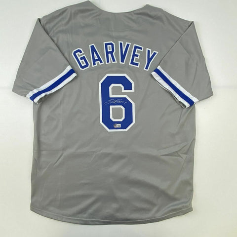 Autographed/Signed STEVE GARVEY Los Angeles Grey Baseball Jersey Beckett BAS COA