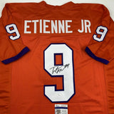 Autographed/Signed TRAVIS ETIENNE Clemson Orange College Football Jersey JSA COA