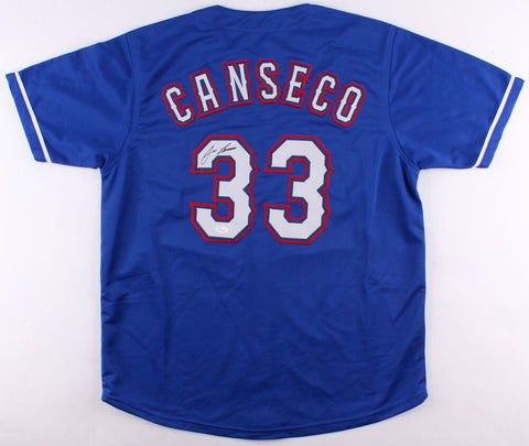 Jose Canseco Signed Texas Rangers Blue Jersey (JSA COA) 2xWorld Series Champion