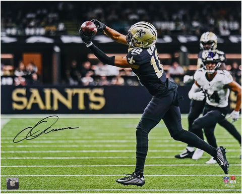 Chris Olave New Orleans Saints Autographed 16" x 20" Catch in Black Photograph