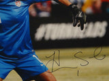 Hope Solo Autographed 16x20 Team USA Throwing Ball Photo- JSA Authenticated