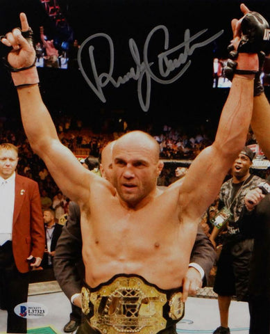 Randy Couture Autographed UFC 8x10 Photo With Belt- Beckett Auth *Silver