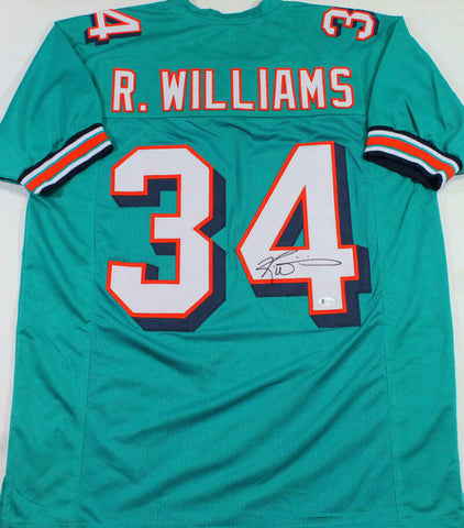Ricky Williams Autographed Teal Pro Style Jersey - Beckett W Auth *4